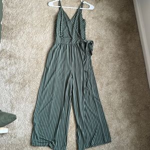 Green jumpsuit in size medium